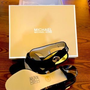 Michael Kors black patent leather never worn.